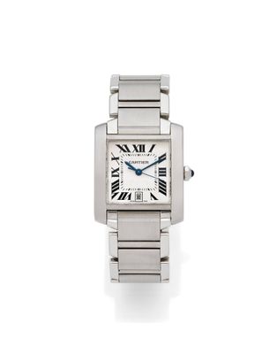 a close up of a wrist watch with roman numerals on it