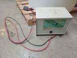 a small machine that is sitting on the floor