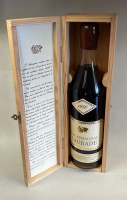 a bottle of wine in a wooden box on a table