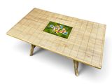 a bamboo table with a tile on it