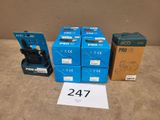 four boxes of electronic equipment sitting on top of a table