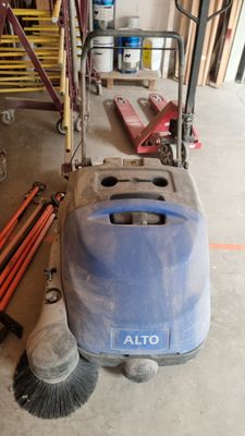 an image of a cleaning machine in a garage