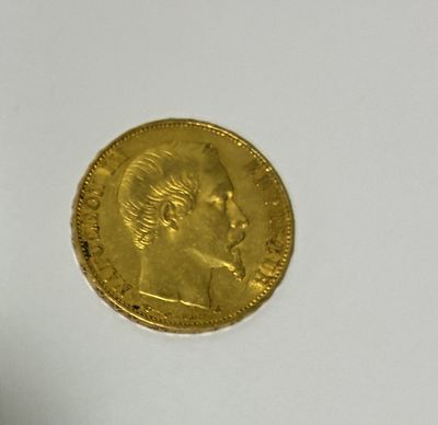 an image of a gold coin on a white surface