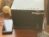 an image of a desk with a computer and a cell phone on it