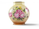 a yellow vase with pink roses on it on a white background