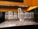 a lot of empty cups on the counter in the kitchen