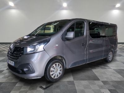 an image of a silver van parked in a garage