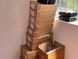 boxes stacked on top of each other in front of a window
