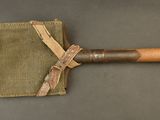 an old baseball bat with a wooden handle on a table