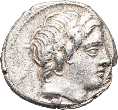une pièce d'argent portant une tête d'homme