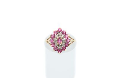a close up of a pink and white diamond ring on a white surface