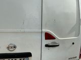 a white van that is parked on the side of the road