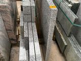 a lot of granite blocks stacked on top of each other