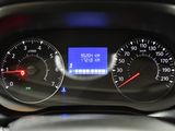 a close up of a car dashboard with a speedometer and gauges