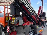 a large crane that is parked in a building