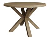 a round wooden table with a cross legs and a wooden top