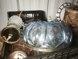a basket full of assorted items sitting on the floor