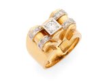une bague en or jaune 18k et diamants