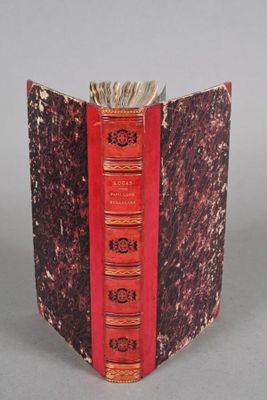 a red book that has a red cover on it