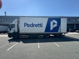 a delivery truck that is parked in a parking lot