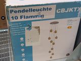 a cardboard box with a picture of a lamp inside of it
