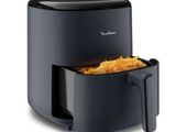 gros plan d'une friteuse avec des frites dedans