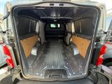 the inside of a van with the doors open and the cargo door open