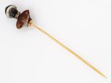 an image of a wooden stick with a wooden handle on a white surface