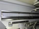 an image of a commercial kitchen with a lot of counter space