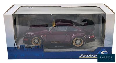 the box is open to show the purple car in it ' s packaging
