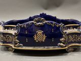 an image of a blue and gold bowl on a table