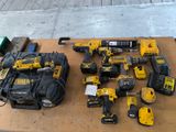 a lot of power tools that are on a table