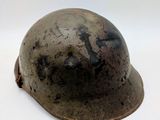 a close up of a helmet on a white surface