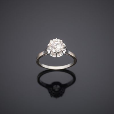 a diamond single - stone ring, by van cleef