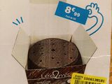 packaging of a box of cookies sitting on top of a wooden table