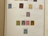 an open book with a picture of stamps on it