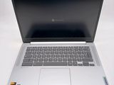 an open laptop computer sitting on top of a white table
