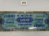 a close up of a piece of paper money on a table