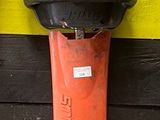a fire hydrant that is attached to a wall