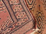 a close up of a rug with a pattern on it