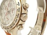 the watch is silver and brown