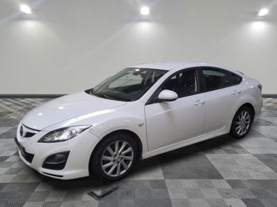 a picture of a white car on a checkered floor