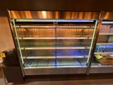 a refrigerated display case in a grocery store