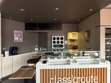 an image of a glasshouse coffee shop in a mall