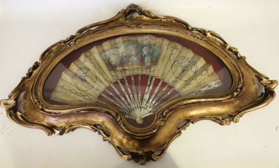 une photo d'un ventilateur accroché au mur