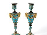 pair of antique blue and gold vases on a white background