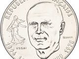 the coin has a drawing of a man ' s face on it