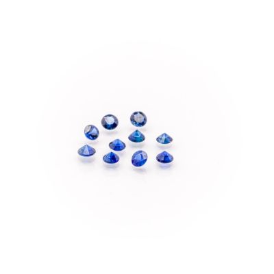 a group of blue sapphires on a white background