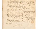 un gros plan d'un morceau de papier sur lequel on a écrit