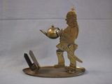 a statue of a man holding a pot and a laptop
